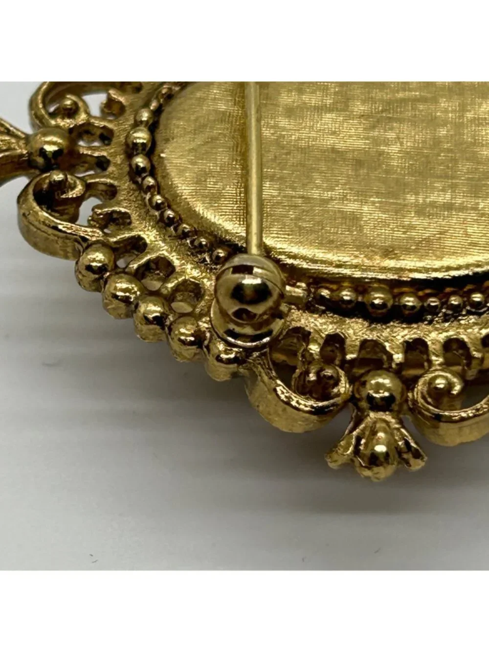 Avon this brooch